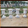 White natural hand carved flower pot planting flowers